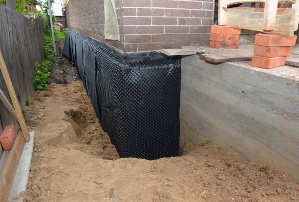 SJ Waterproofing Pros technician performing targeted Waterproofing assessment in Rosalia, KS